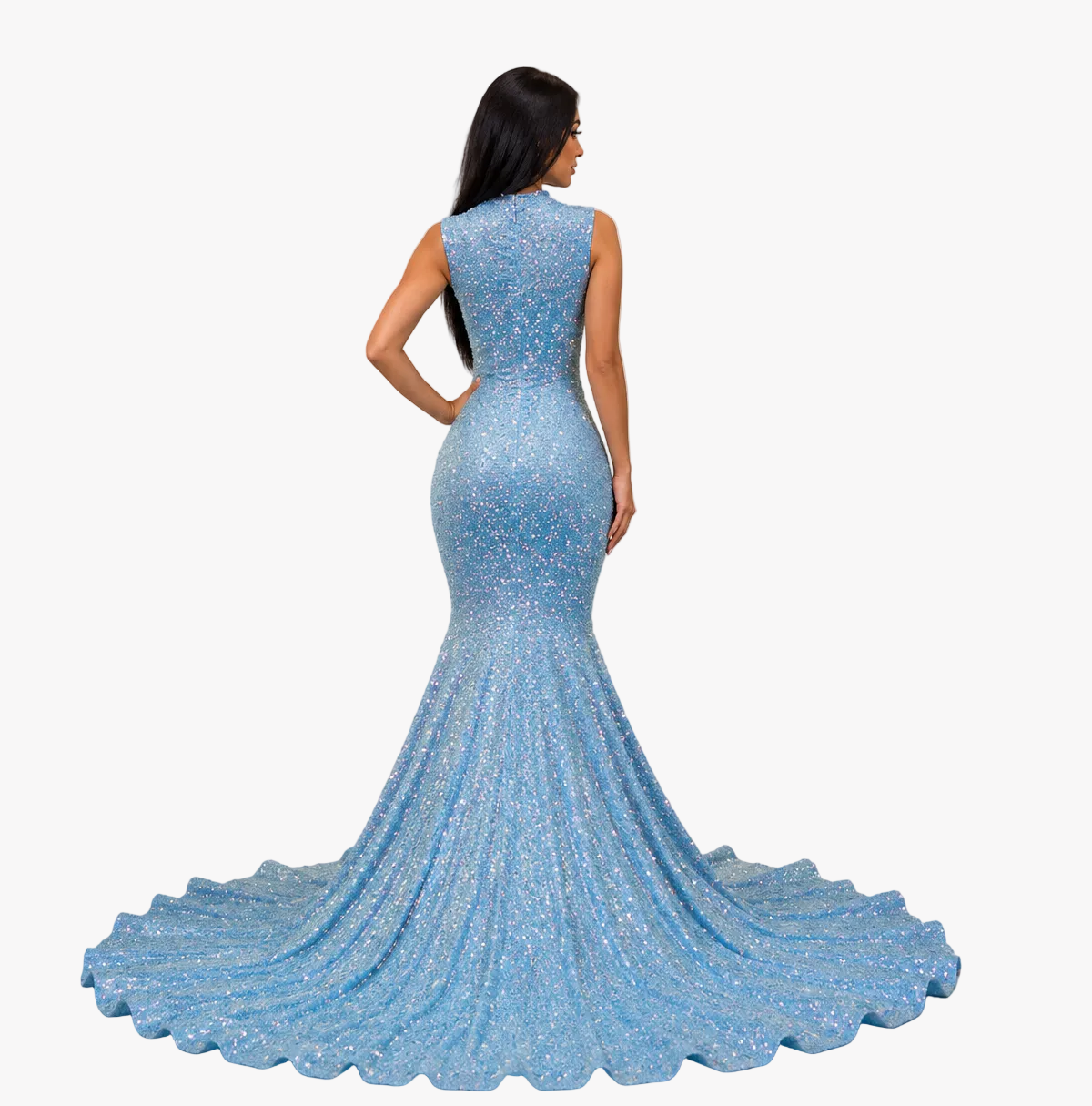 A woman stands with her back to the camera wearing a sleeveless, light blue sequined mermaid gown with a dramatic train in an elegant indoor showroom. A mannequin in a champagne gown stands to the right, and the words 'Confidential Kouture' are displayed on the wall.