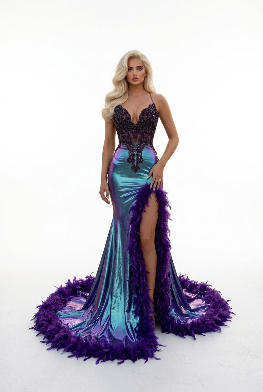 A blonde model wears a mermaid-style evening gown with a black lace bodice, iridescent teal-to-purple body, and a dramatic purple feathered train on a white studio background.