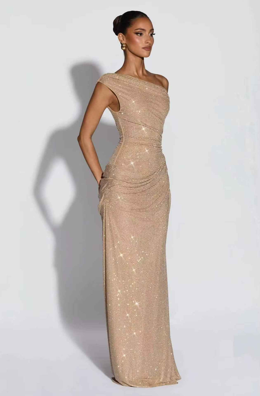Elevate Your Elegance with Our Champagne Gold Rhinestone Gown